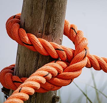 a knot tied around a post