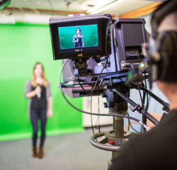 Student in front of video camera