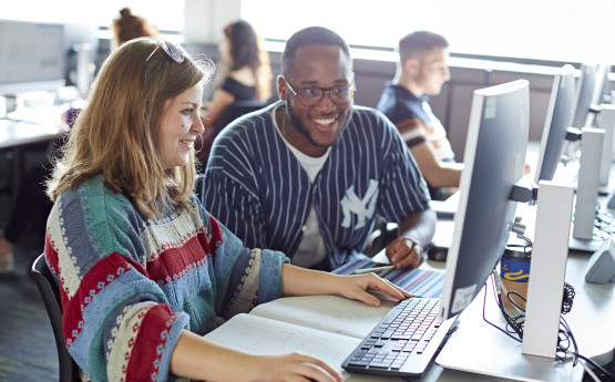 Students working together in the Computer Lab.