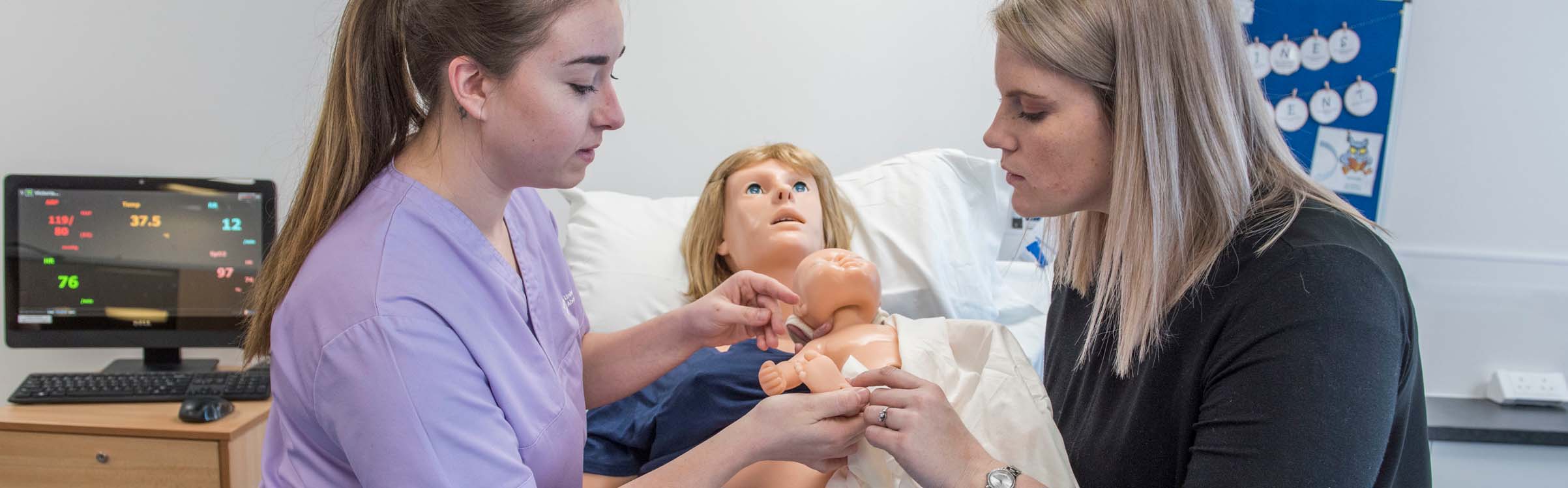 Maternity care student with lecturer