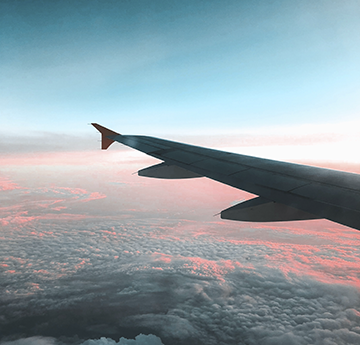 Airplane wing in the sky