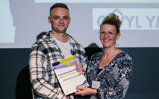 a man receives a certificate